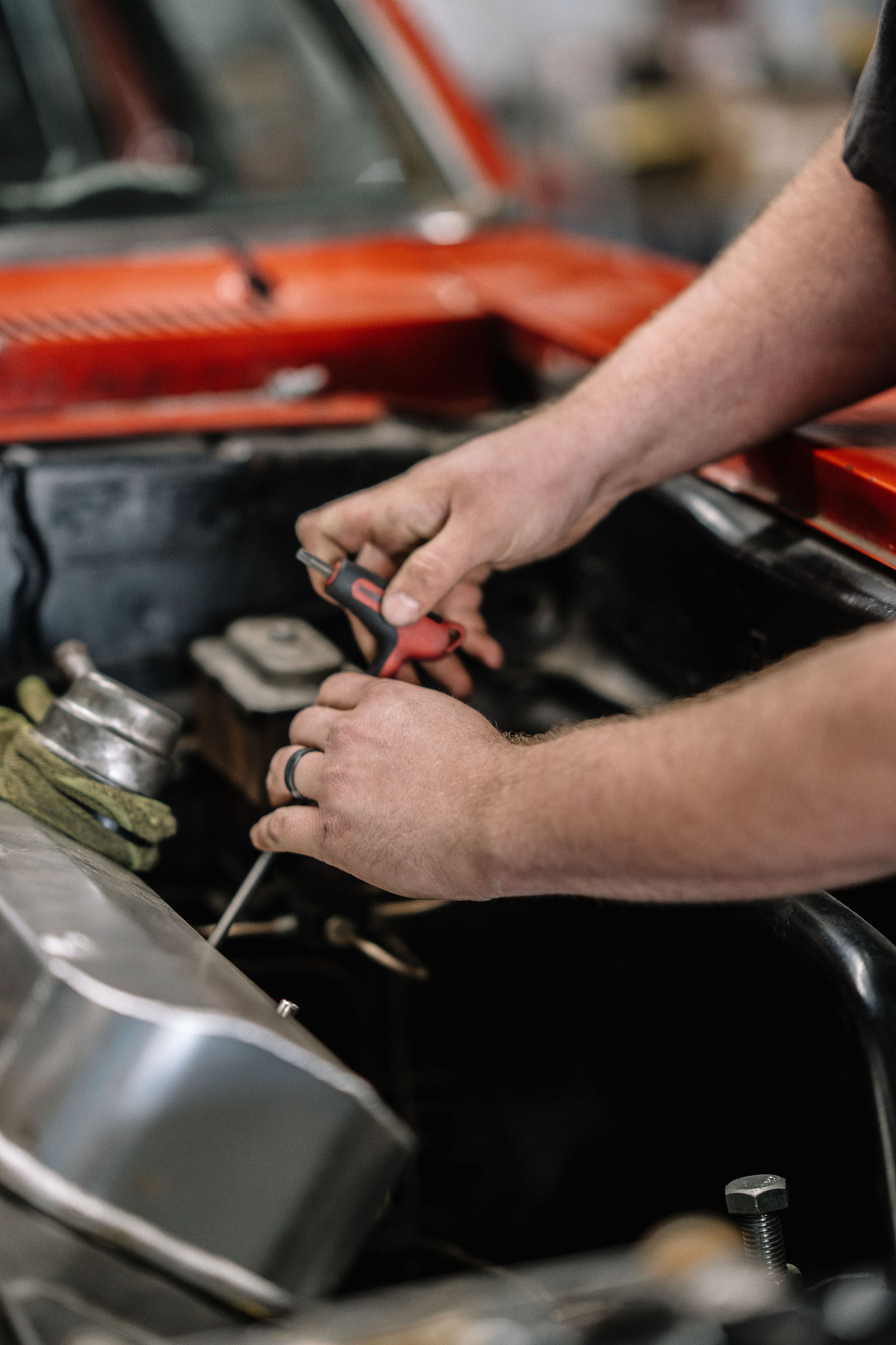 Beacon Automotive technician performing engine repair for Martinez GA customers