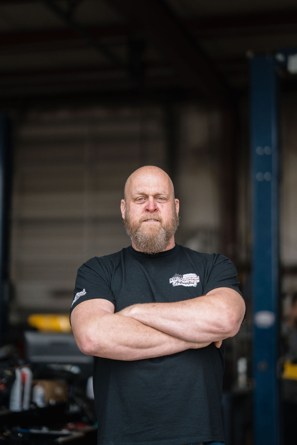 Jeff Hawn, owner of Beacon Automotive, standing in the shop